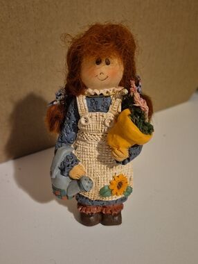 D8 Avon Vintage Garden Girl Figurine in Blue and Cream 5 Inch
